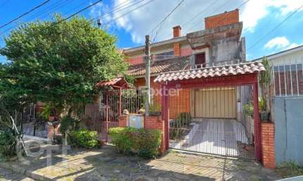 Casa com 3 quartos à venda na Rua Marcos Wainstein, 30, Vila Nova, Porto Alegre, 200 m2 por R$ 470.000