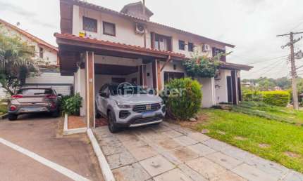 Casa em condomínio fechado com 3 quartos à venda na Avenida Eduardo Prado, 695, Cavalhada, Porto Alegre, 125 m2 por R$ 770.000