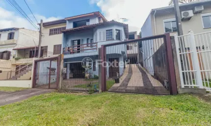 Casa com 5 quartos à venda na Rua Nero José da Silva Filho, 185, Partenon, Porto Alegre, 377 m2 por R$ 742.000