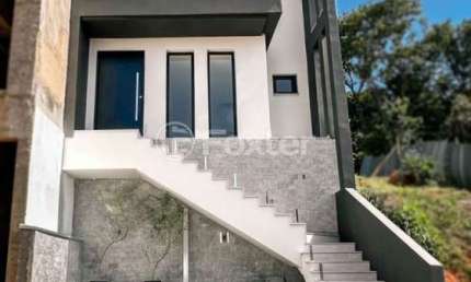 Casa em condomínio fechado com 3 quartos à venda na Rua Tancredo Neves, 990, Jansen, Gravataí, 150 m2 por R$ 799.000