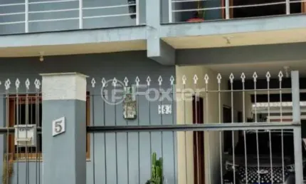 Casa com 3 quartos à venda na Rua Moroty Baldwin Michel, 5, Rubem Berta, Porto Alegre, 183 m2 por R$ 690.000