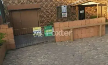 Casa com 3 quartos à venda na Avenida Edgar Pires de Castro, 3190, Restinga, Porto Alegre, 160 m2 por R$ 750.000