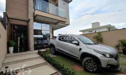 Casa com 3 quartos à venda na Avenida Deltaville, 516, Beira Rio, Biguaçu, 157 m2 por R$ 999.000