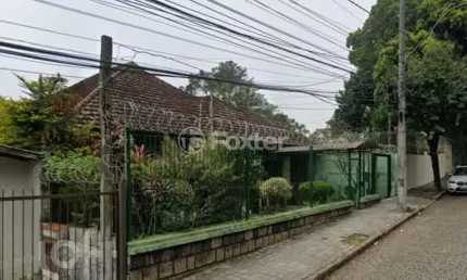 Casa com 3 quartos à venda na rua delfino riet, 116, santo antônio, porto alegre, 1009 m2 por r$ 1.490.000