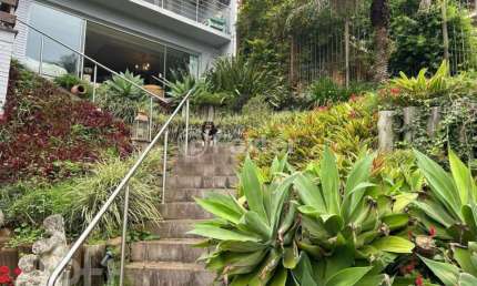 Casa com 3 quartos à venda na Rua Edgar Luiz Schneider, 480, Jardim Isabel, Porto Alegre, 353 m2 por R$ 1.060.000