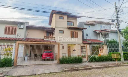 Casa com 3 quartos à venda na Rua Luiz Delfino, 109, Espírito Santo, Porto Alegre, 206 m2 por R$ 850.000