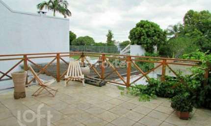Casa com 6 quartos à venda na Rua Padre João Batista Reus, 708, Vila Conceição, Porto Alegre, 408 m2 por R$ 1.500.000