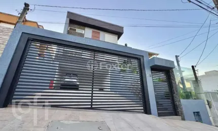 Casa com 3 quartos à venda na rua verdes campos, 110, mário quintana, porto alegre, 289 m2 por r$ 1.400.000