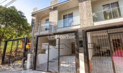 Casa com 3 quartos à venda na Rua Abdo Jorge Curi, 233, Parque Santa Fé, Porto Alegre, 143 m2 por R$ 475.000