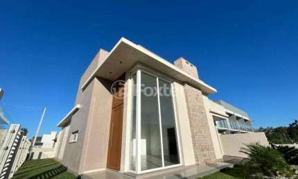 Casa com 3 quartos à venda na Rua Da Garça, 125, Bosque do Albatroz, Osório, 114 m2 por R$ 690.000