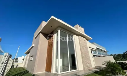 Casa com 3 quartos à venda na Rua Da Garça, 125, Bosque do Albatroz, Osório, 114 m2 por R$ 690.000