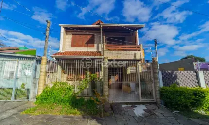 Casa com 3 quartos à venda na Rua Santa Maria, 291, Vila São José, Porto Alegre, 200 m2 por R$ 700.000