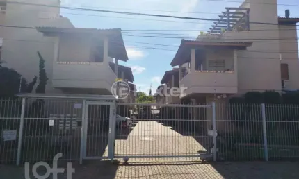 Casa em condomínio fechado com 2 quartos à venda na Avenida Guarujá, 126, Guarujá, Porto Alegre, 102 m2 por R$ 430.000