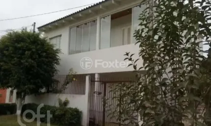Casa com 3 quartos à venda na Rua Orígenes Lessa, 195, Mário Quintana, Porto Alegre, 198 m2 por R$ 300.000