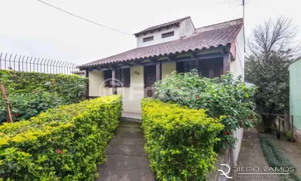 Casa com 3 quartos à venda na Avenida Rodrigues da Fonseca, 1728, Vila Nova, Porto Alegre, 188 m2 por R$ 688.000