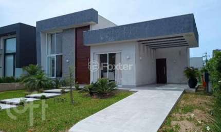 Casa em condomínio fechado com 3 quartos à venda na Rua Onório Germano, 2005, Arco Íris, Capão da Canoa, 135 m2 por R$ 1.470.000