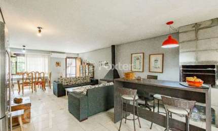 Casa com 4 quartos à venda na Rua Ângelo Crivellaro, 333, Jardim do Salso, Porto Alegre, 212 m2 por R$ 780.000