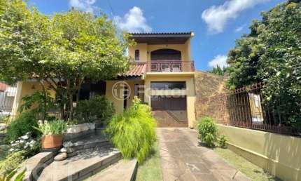 Casa com 3 quartos à venda na Rua Nações Unidas, 493, Nossa Senhora das Graças, Canoas, 189 m2 por R$ 750.000