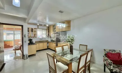 Casa com 3 quartos à venda na Rua Raymundo Luiz Marinho Filho, 299, Parque Santa Fé, Porto Alegre, 125 m2 por R$ 615.000