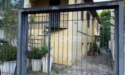 Casa com 3 quartos à venda na Rua Felicíssimo de Azevedo, 753, Auxiliadora, Porto Alegre, 100 m2 por R$ 640.000