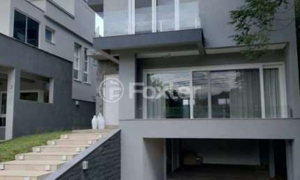 Casa em condomínio fechado com 3 quartos à venda na Avenida Senador Salgado Filho, 8500, Querência, Viamão, 271 m2 por R$ 1.300.000