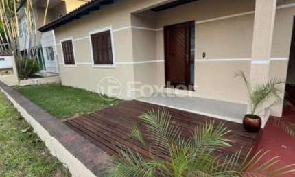 Casa em condomínio fechado com 4 quartos à venda na Estrada Capitão Gentil Machado de Godoy, 4500, Vila Elsa, Viamão, 224 m2 por R$ 890.000