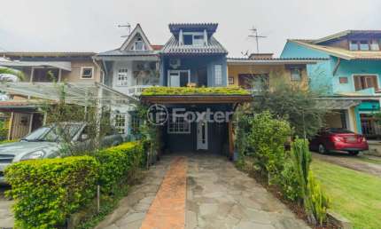 Casa em condomínio fechado com 3 quartos à venda na Avenida Juca Batista, 1458, Cavalhada, Porto Alegre, 132 m2 por R$ 595.000