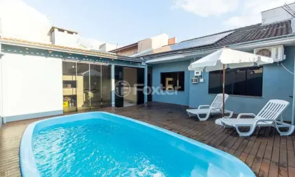 Casa com 3 quartos à venda na Rua dos Hibiscos, 495, Parque da Matriz, Gravataí, 150 m2 por R$ 759.000