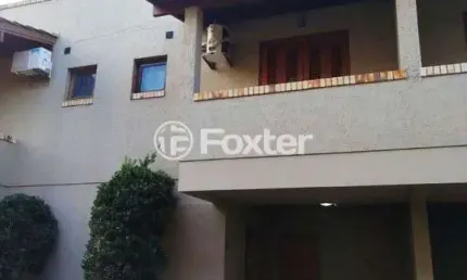 Casa em condomínio fechado com 2 quartos à venda na Avenida Guarujá, 126, Guarujá, Porto Alegre, 102 m2 por R$ 430.000