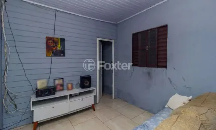 Casa com 3 quartos à venda na Rua Moroty Baldwin Michel, 175, Rubem Berta, Porto Alegre, 85 m2 por R$ 190.800