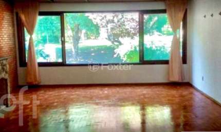 Casa com 3 quartos à venda na Rua General Nestor Silva Soares, 391, Três Figueiras, Porto Alegre, 250 m2 por R$ 1.630.000