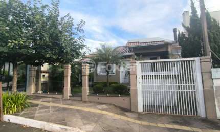 Casa com 3 quartos à venda na Rua Antônio Ramos, 219, Loteamento Jardim Timbaúva, Gravataí, 145 m2 por R$ 749.000