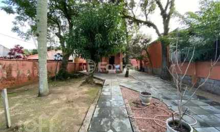Casa com 3 quartos à venda na Rua Mura, 238, Guarujá, Porto Alegre, 250 m2 por R$ 780.000