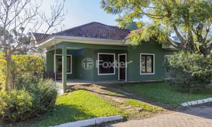 Casa em condomínio fechado com 3 quartos à venda na Estrada Capitão Gentil Machado de Godoy, 4500, Vila Elsa, Viamão, 128 m2 por R$ 850.000