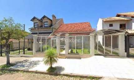 Casa com 3 quartos à venda na Rua Alfredo Varela, 84, Teresópolis, Porto Alegre, 128 m2 por R$ 600.000