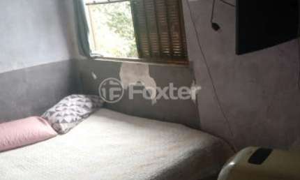 Casa com 2 quartos à venda na Bloco 179 (Cj Hab R C Gonçalves), 16, Jardim Santa Rita, Guaíba, 46 m2 por R$ 200.000
