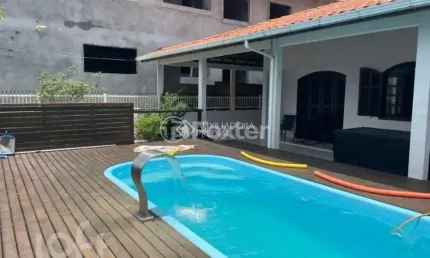 Casa com 4 quartos à venda na Rua Pica-Pau, 474, Enseada de Brito, Palhoça, 200 m2 por R$ 958.000
