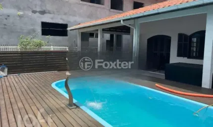 Casa com 4 quartos à venda na Rua Pica-Pau, 474, Enseada de Brito, Palhoça, 200 m2 por R$ 958.000