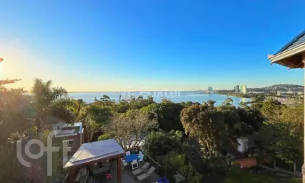 Casa com 4 quartos à venda na Rua Bororó, 157, Vila Assunção, Porto Alegre, 428 m2 por R$ 2.650.000