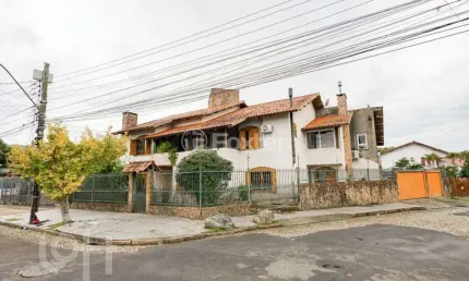 Casa com 5 quartos à venda na Rua Ernestina Amaro Torelly, 80, Jardim Carvalho, Porto Alegre, 413 m2 por R$ 1.500.000
