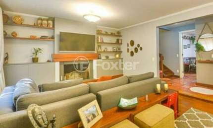 Casa em condomínio fechado com 3 quartos à venda na Rua Professor Carlos de Paula Couto, 500, Cavalhada, Porto Alegre por R$ 1.300.000