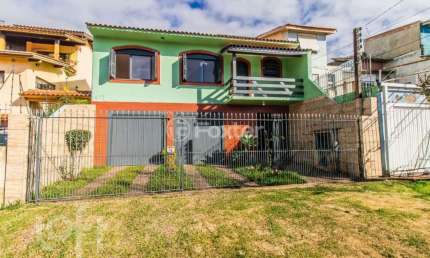 Casa com 3 quartos à venda na Avenida Sargento Manoel Raymundo Soares, 161, Jardim Carvalho, Porto Alegre, 265 m2 por R$ 780.000