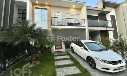 Casa em condomínio fechado com 4 quartos à venda na Avenida Deltaville, 20, Beira Rio, Biguaçu, 220 m2 por R$ 1.389.000
