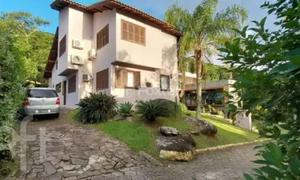 Casa com 5 quartos à venda na Avenida Luiz Boiteux Piazza, 3772, Cachoeira do Bom Jesus, Florianópolis, 220 m2 por R$ 1.850.000