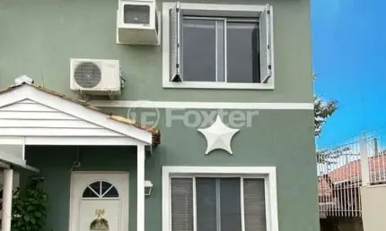 Casa em condomínio fechado com 3 quartos à venda na Avenida Santos Ferreira, 1180, Marechal Rondon, Canoas, 78 m2 por R$ 480.000