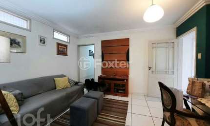 Casa com 3 quartos à venda na Avenida Mariland, 1056, Auxiliadora, Porto Alegre, 259 m2 por R$ 1.200.000