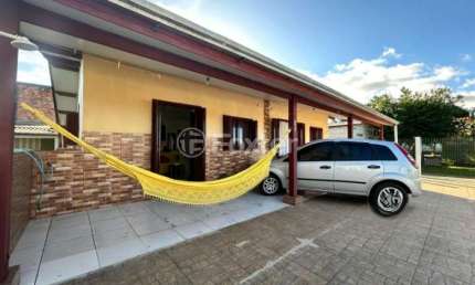 Casa com 5 quartos à venda na Avenida A, 84, Mariluz Norte, Imbé, 191 m2 por R$ 320.000