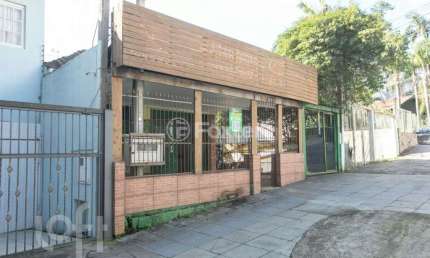 Casa com 3 quartos à venda na Avenida Montenegro, 111, Petrópolis, Porto Alegre, 280 m2 por R$ 1.450.000
