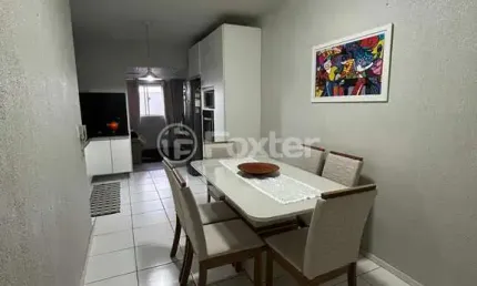Casa em condomínio fechado com 2 quartos à venda na Rua Jozino Liotti, 300, Jardim Algarve, Alvorada, 44 m2 por R$ 250.000