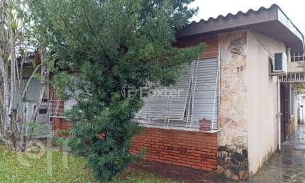Casa com 3 quartos à venda na Rua Rossini, 75, São Sebastião, Porto Alegre, 144 m2 por R$ 750.000